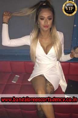 a hot escort girl in pink clothes